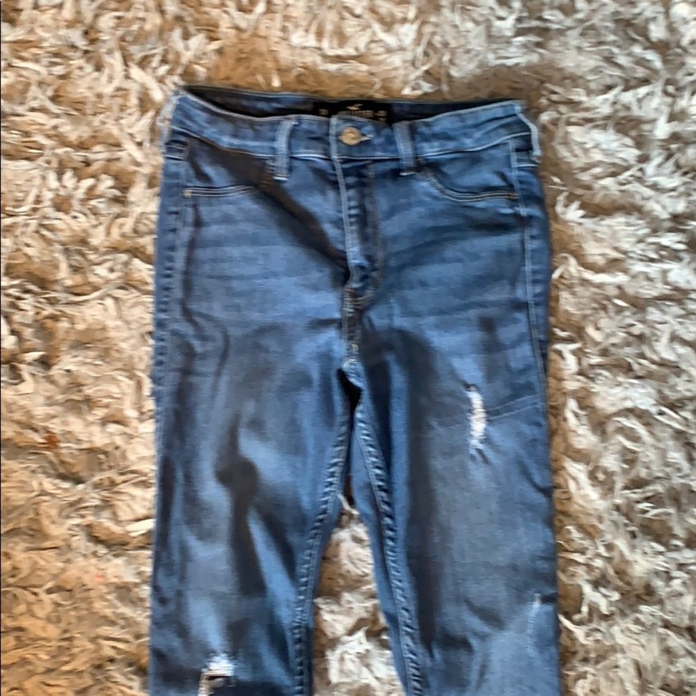 darkish blue ,slightly ripped, high-waisted jeans